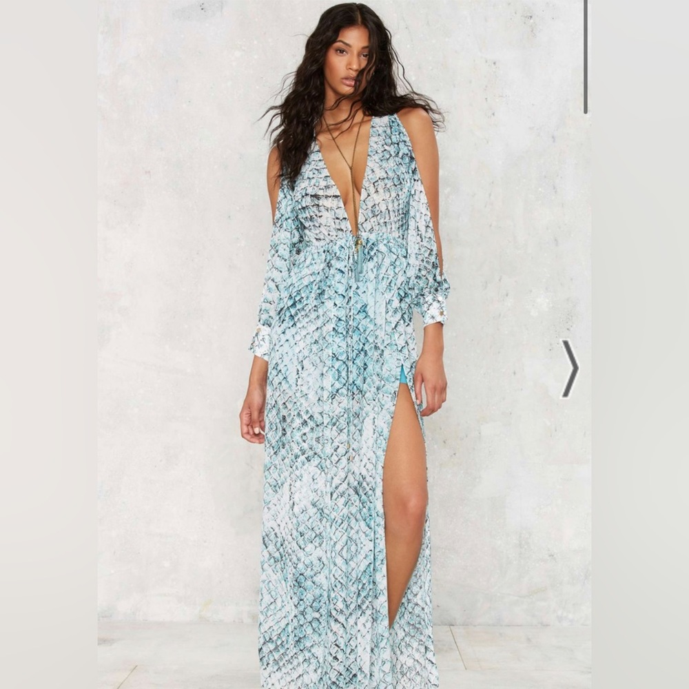 Snakeskin turquoise maxi dress with slits at both thighs.